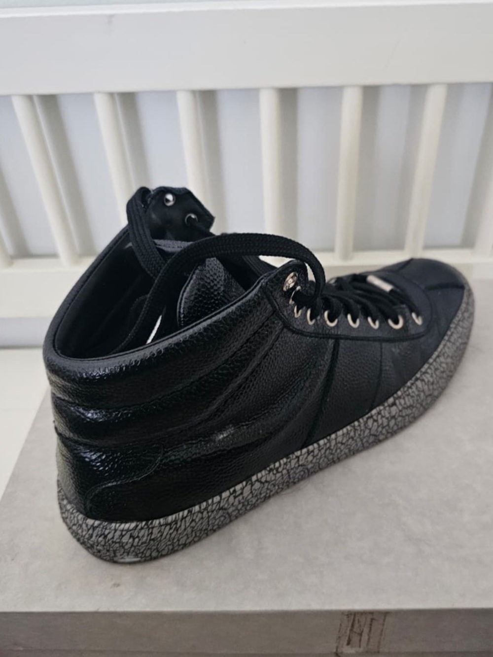 Black High-Top Sneaker with Cracked Gray Sole
